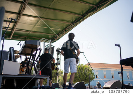Band performing in front of the audience 108787796