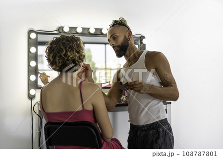 Bearded gay professional make-up artist on backstage Bearded gay professional make-up artist on backstage 108787801