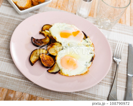Appetizing fried eggs made with eggplants Appetizing fried eggs made with eggplants 108790972
