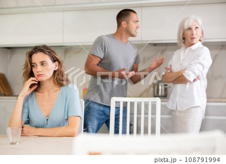 Young girl with her mother-in-law and husband Young girl with her mother-in-law and husband 108791994