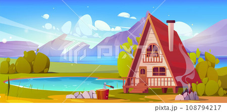 Wooden hut on shore of lake near rocky mountains Wooden hut on shore of lake near rocky mountains 108794217