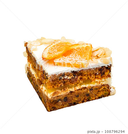 A piece of Carrot cake with orange, lemon, candied fruits and nuts zest, curd cream and orange marmalade isolated on white 108796294