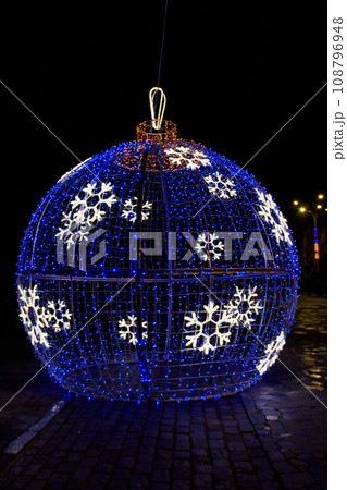 Large illuminated Christmas bauble on a city square Large illuminated Christmas bauble on a city square 108796948