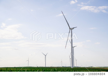 Agricultural field with wind turbines Agricultural field with wind turbines 108804804