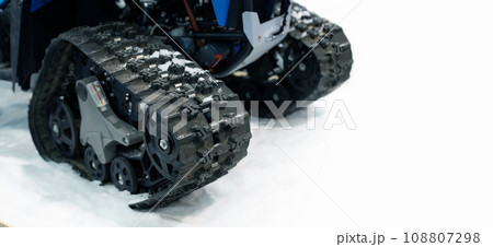 Close up of a tracked snowmobile 108807298