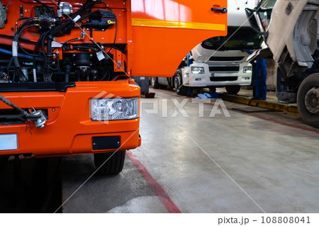 Trucks repair in car service 108808041