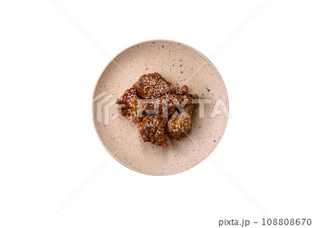 Delicious grilled chicken wings with salt, spices and teriyaki sauce 108808670