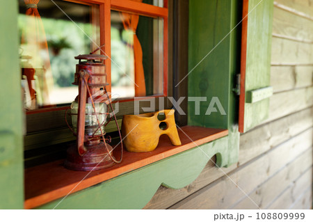 Traditional Finnish wooden mug kuksa and vintage lantern Traditional Finnish wooden mug kuksa and vintage lantern 108809999