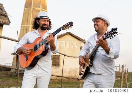 Musicians in white clothes Musicians in white clothes 108810402