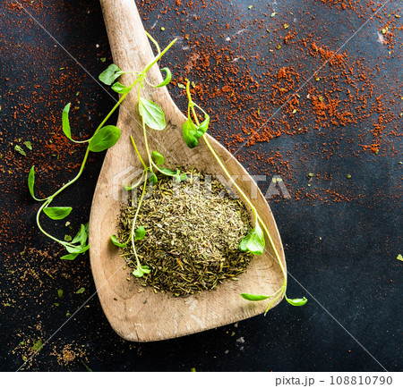 wooden spoons with spices and herbs wooden spoons with spices and herbs 108810790