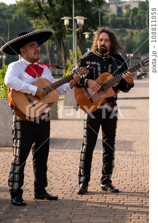 Mexican musician mariachi band on a city street. 108811058