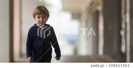 Adventurous Little Boy Explores the Urban Jungle 108811561