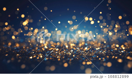 Abstract blue and gold shiny Christmas background with bokeh. Holiday bright blurred backdrop with particles. 108812899