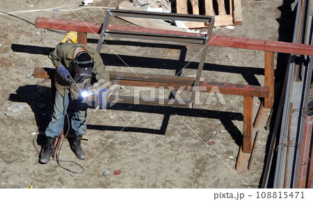Kiev, Ukraine March 13, 2019: Workers - zero-cycle construction of the foundation of an entertainment center Kiev, Ukraine March 13, 2019: Workers - zero-cycle construction of the foundation of an entertainment center 108815471