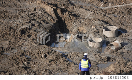 Kiev, Ukraine March 13, 2019: Workers - zero-cycle construction of the foundation of an entertainment center Kiev, Ukraine March 13, 2019: Workers - zero-cycle construction of the foundation of an entertainment center 108815508