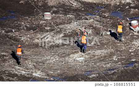 Kiev, Ukraine March 13, 2019: Workers - zero-cycle construction of the foundation of an entertainment center Kiev, Ukraine March 13, 2019: Workers - zero-cycle construction of the foundation of an entertainment center 108815551