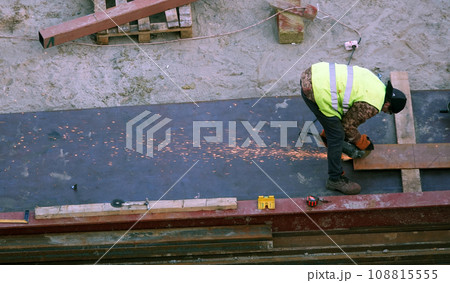 Kiev, Ukraine March 13, 2019: Workers - zero-cycle construction of the foundation of an entertainment center Kiev, Ukraine March 13, 2019: Workers - zero-cycle construction of the foundation of an entertainment center 108815555