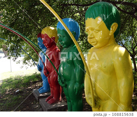 Kiev, Ukraine June 16, 2021: Monument to the peeing boys in the park "Kievan Rus" in the city of Kiev Kiev, Ukraine June 16, 2021: Monument to the peeing boys in the park "Kievan Rus" in the city of Kiev 108815638