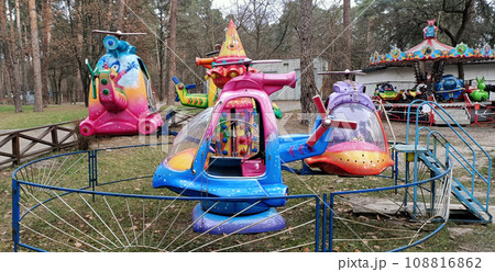 Kiev, Ukraine January 10, 2021: Children's attractions in the park of the city of Kiev Kiev, Ukraine January 10, 2021: Children's attractions in the park of the city of Kiev 108816862