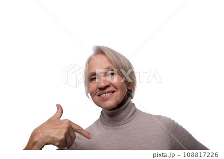 European senior woman with gray hair smiling on white background European senior woman with gray hair smiling on white background 108817226