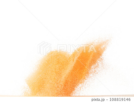 Small size orange Sand flying explosion, fruit sands grain wave explode. Abstract cloud fly. Orange colored sand splash throwing in Air. White background Isolated high speed shutter, throwing freeze Small size orange Sand flying explosion, fruit sands grain wave explode. Abstract cloud fly. Orange colored sand splash throwing in Air. White background Isolated high speed shutter, throwing freeze 108819146