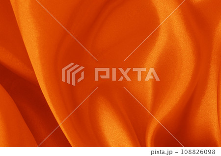 Orange fabric cloth texture for background and design art work, beautiful crumpled pattern of silk or linen. Orange fabric cloth texture for background and design art work, beautiful crumpled pattern of silk or linen. 108826098