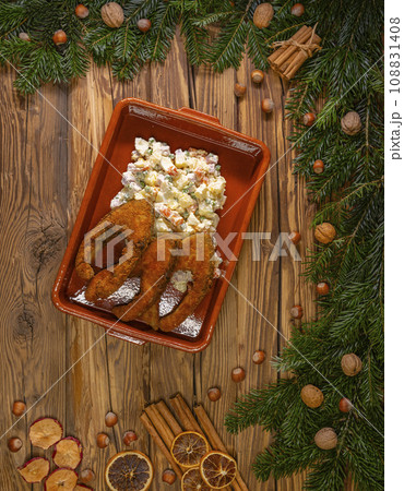 Traditional Christmas dinner in Czech Republic - fried carp with potato salad 108831408