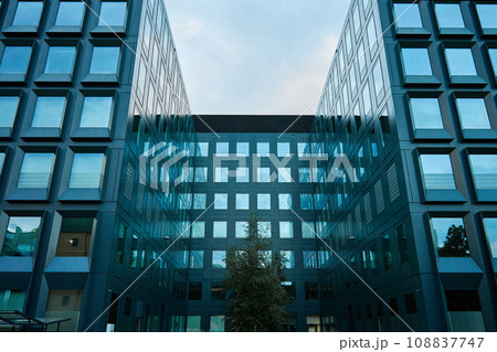 Office building. House facade in city. Business center exterior. Modern city architecture 108837747