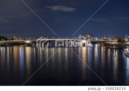 Evening view of the Deutz Bridge in Cologne, lights reflected in the Rhine 108838218