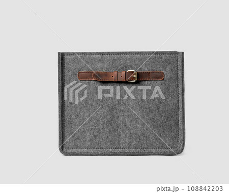 Gray storage box of natural felt with leather handles and buckles Gray storage box of natural felt with leather handles and buckles 108842203