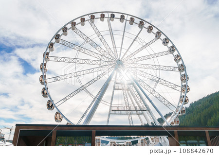 Big tall white ferris wheel in front of perfect blue sky in Bukovel. Carpathians Ukraine 108842670