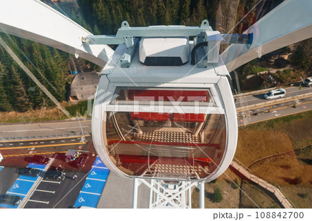 Big tall white ferris wheel in front of perfect blue sky in Bukovel. Carpathians Ukraine 108842700