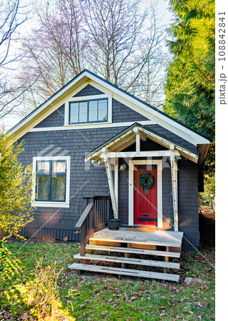 Main entrance of residential house on fall season in British Columbia, Canada Main entrance of residential house on fall season in British Columbia, Canada 108842841