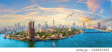 Wonderful aerial view of the Gezira island on the Nile river, great sky scenery of Cairo, Egypt Wonderful aerial view of the Gezira island on the Nile river, great sky scenery of Cairo, Egypt 108843385