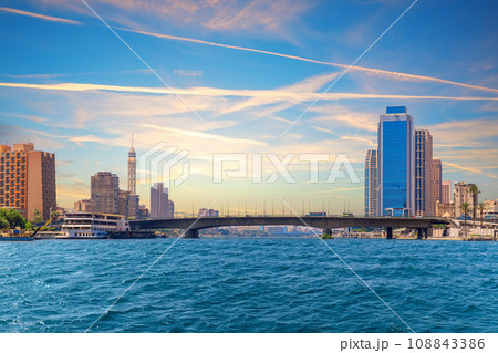 Nile river, bridge, tv tower and famous buildings of Cairo, Egypt 108843386