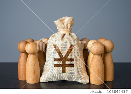 People figures stand around Chinese yuan or japanese yen money bag. Crowdfunding and fundraising. Organization of the community budget. Social politics. Deposits and loans. Salaries. Social payments. 108843457