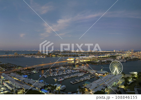 Luxury yachts docked in Biscayne Bay harbor in downtown district of Miami city in Florida, USA 108846155