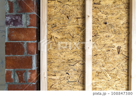 Close up detail of house construction wooden wall elements. Interior frame renovation work 108847380