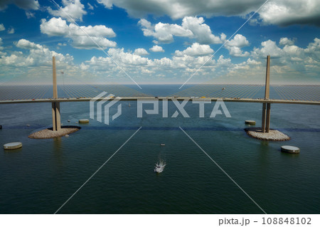 Aerial view of Sunshine Skyway Bridge over Tampa Bay in Florida with moving traffic. Concept of transportation infrastructure 108848102