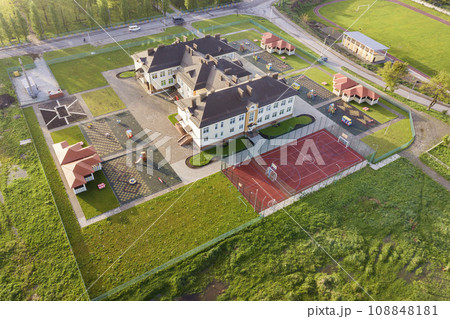 Aerial view of new prescool building in residential rural area. 108848181