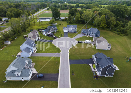 Aerial view of large private homes in Rochester, NY residential area. New family houses as example of real estate development in american suburbs 108848242