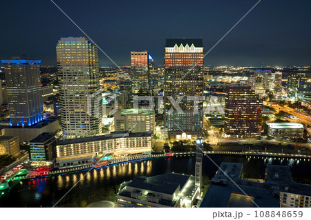 Aerial view of downtown district of Tampa city in Florida, USA. Brightly illuminated high skyscraper buildings in modern American midtown. 108848659