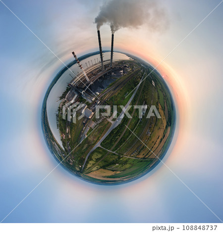 Aerial view from high altitude of little planet earth with coal power plant high pipes with black smokestack polluting atmosphere. Electricity production with fossil fuel concept 108848737