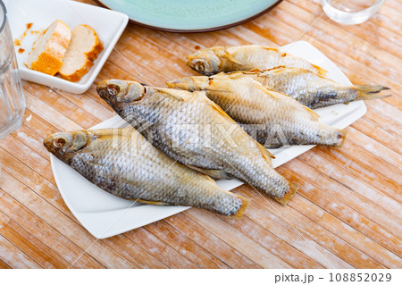 Air-dried salted gutted fish roach 108852029