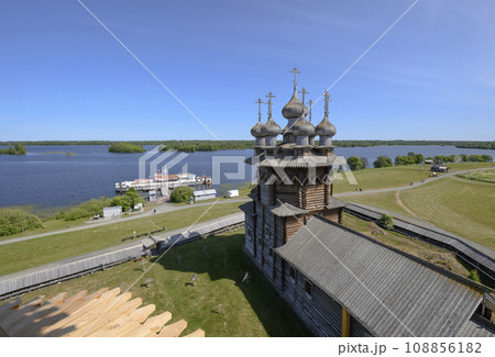 Aerial view of domes and crosses of medieval wooden Church on Kizhi Island on Onega Lake in Karelia 108856182