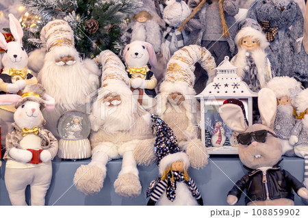 Fairytale Nordic Christmas characters on store counter. Dwarves, elves, rabbits 108859902
