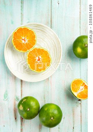 fresh citrus fruits on wooden table fresh citrus fruits on wooden table 108861469