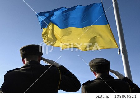 Ukrainian soldiers giving salute. Flag of Ukraine. Armed Forces of Ukraine. Ukrainian army. Ukrainian soldiers giving salute. Flag of Ukraine. Armed Forces of Ukraine. Ukrainian army. 108866521