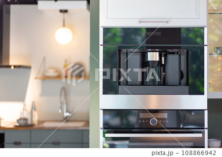 Contemporary and modern Coffee machine building furniture in the kitchen. Contemporary and modern Coffee machine building furniture in the kitchen. 108866942