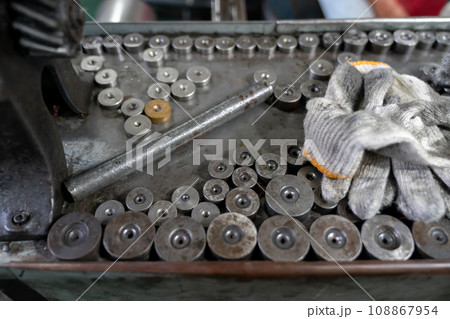 Machine and tool of Computer numerical control CNC, factory creates metal religion art such as Gold rolling machine and little jewelry in religious ceremony. 108867954